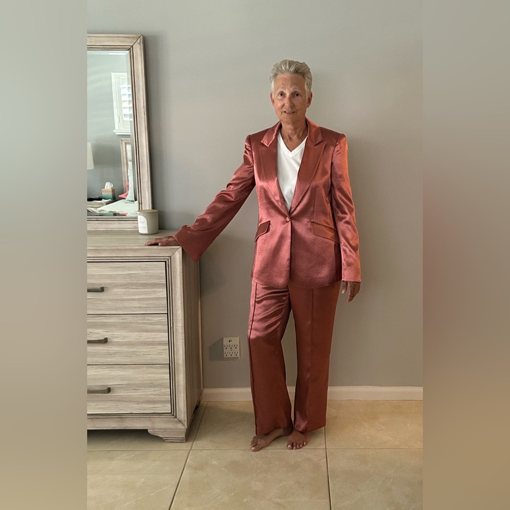 Saks 5th Avenue women’s shiny salmon colored suit